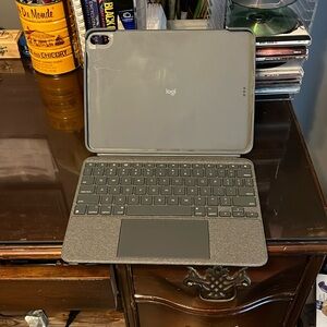 Logitech 9th generation iPad case with keyboard and trackpad.